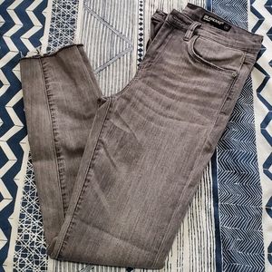 Gray medium wash the bond mid rise skinny jeans